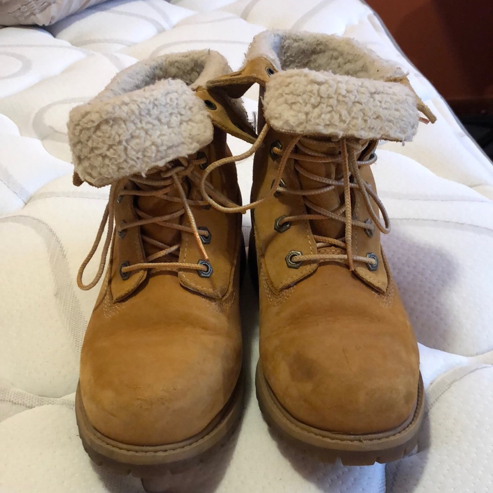 Worn timberland fold over boots